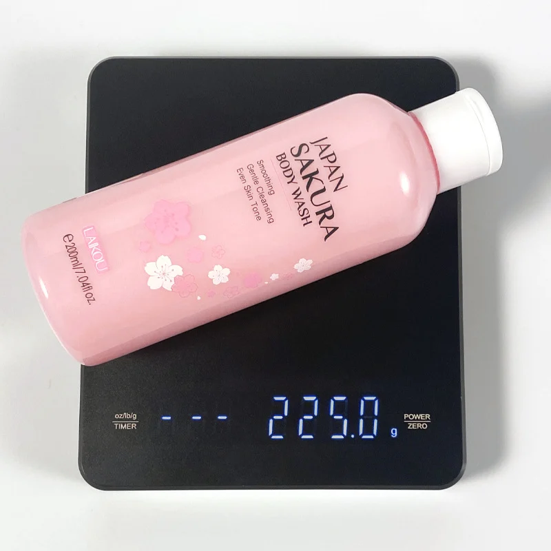 My Quest for a Body Wash That Doesn't Leave My Skin Screaming for Lotion (And Why This One Might Be It) 2 Close-up of pearlescent pink LAIKOU Sakura Body Wash gel being poured onto a hand
